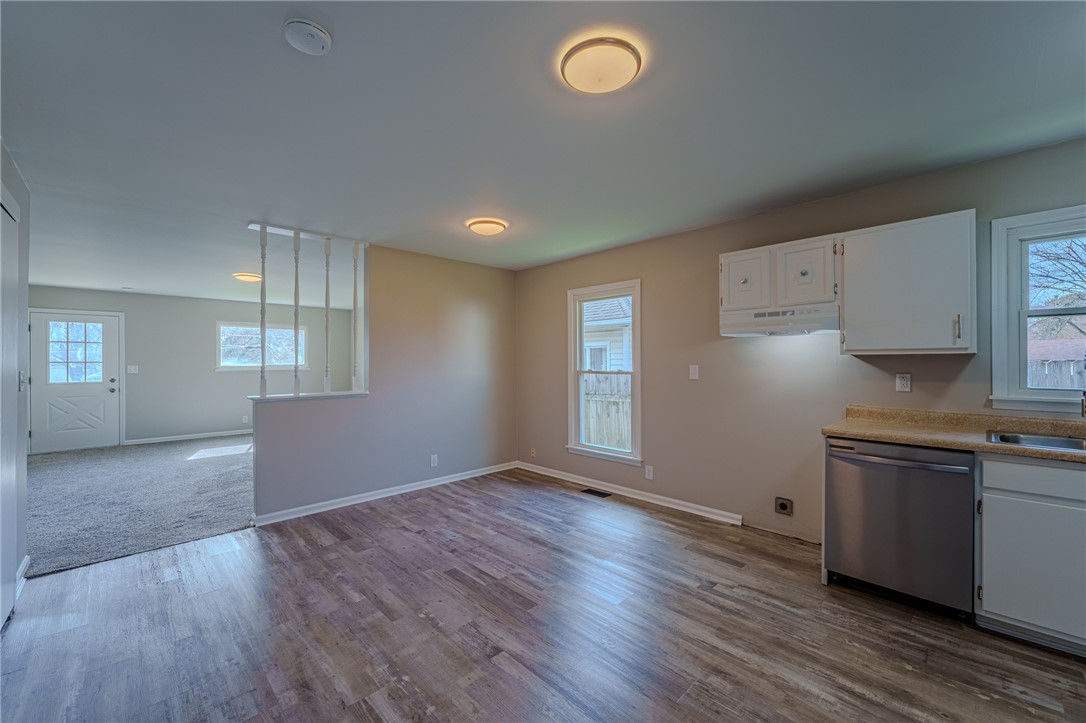 1005 Burt Street Springfield, OH 45505 - Photo 12 of 33 Bright and inviting open-concept living area seamlessly transitions from kitchen to common space.