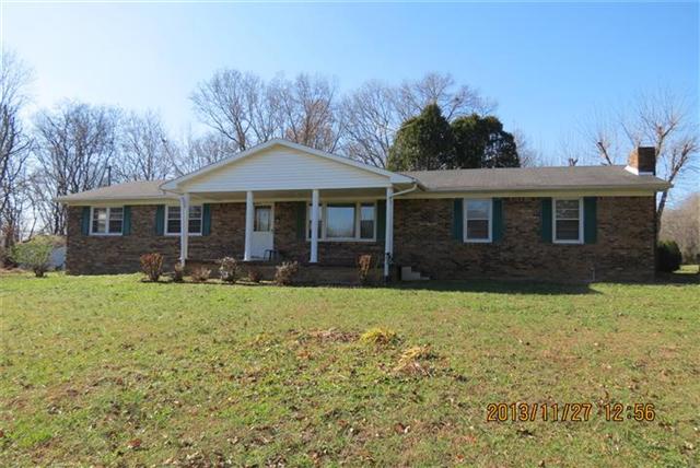 Spacious 3 Bedroom, 1.5 Bath Brick Ranch on 2.55 Acres+/-.