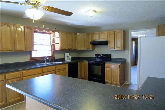 Spacious Kitchen with Pantry; Range, Refrigerator, Dishwasher to Convey.