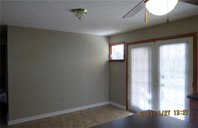3900 Highway 49 Tennessee Ridge, TN 37178 - Photo 10 of 20 Dining Area with French Doors out to the Covered Patio.
