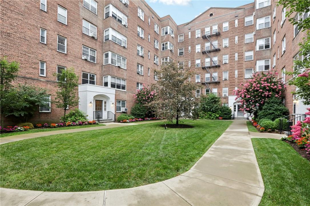 1 Bronxville Road, Unit 2B Bronxville, NY 10708 - Photo 1 of 1 View of community featuring a lawn