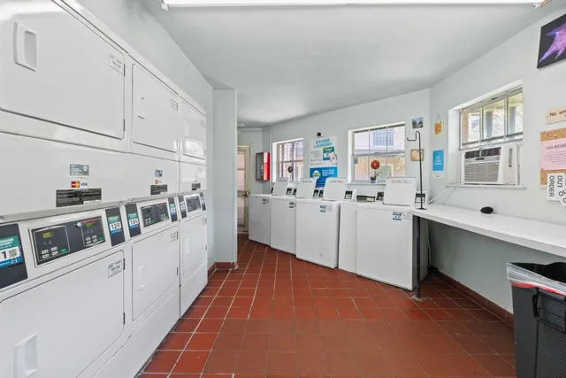 a kitchen with stainless steel appliances a sink and dishwasher