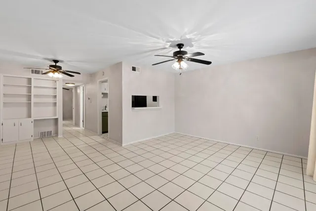 a view of a livingroom with a furniture