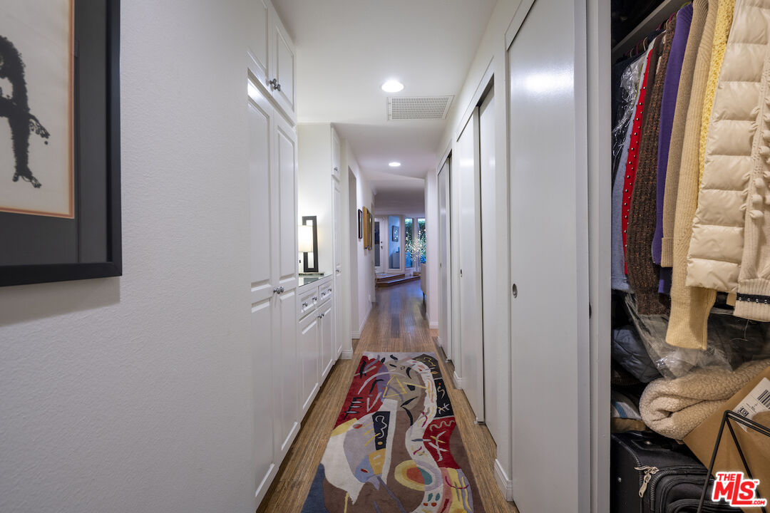 11687 Bellagio Road, Unit 3 Los Angeles, CA 90049 - Photo 31 of 31 a view of a hallway with interior of the house