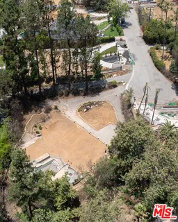 an aerial view of residential house with outdoor space