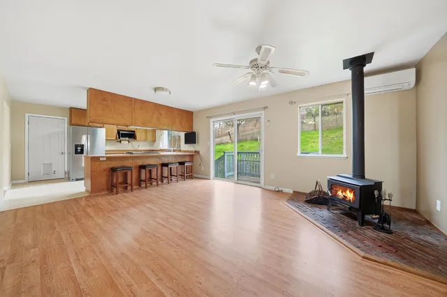 a workspace with furniture and wooden floor