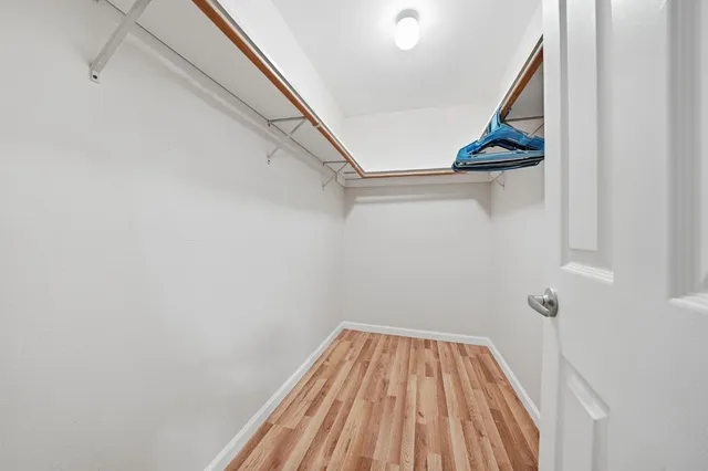 a view of a room with racks on the wall