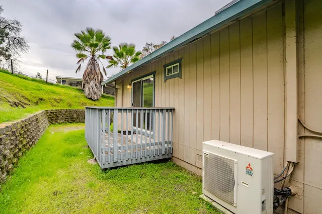 a backyard of a house with lots of green space