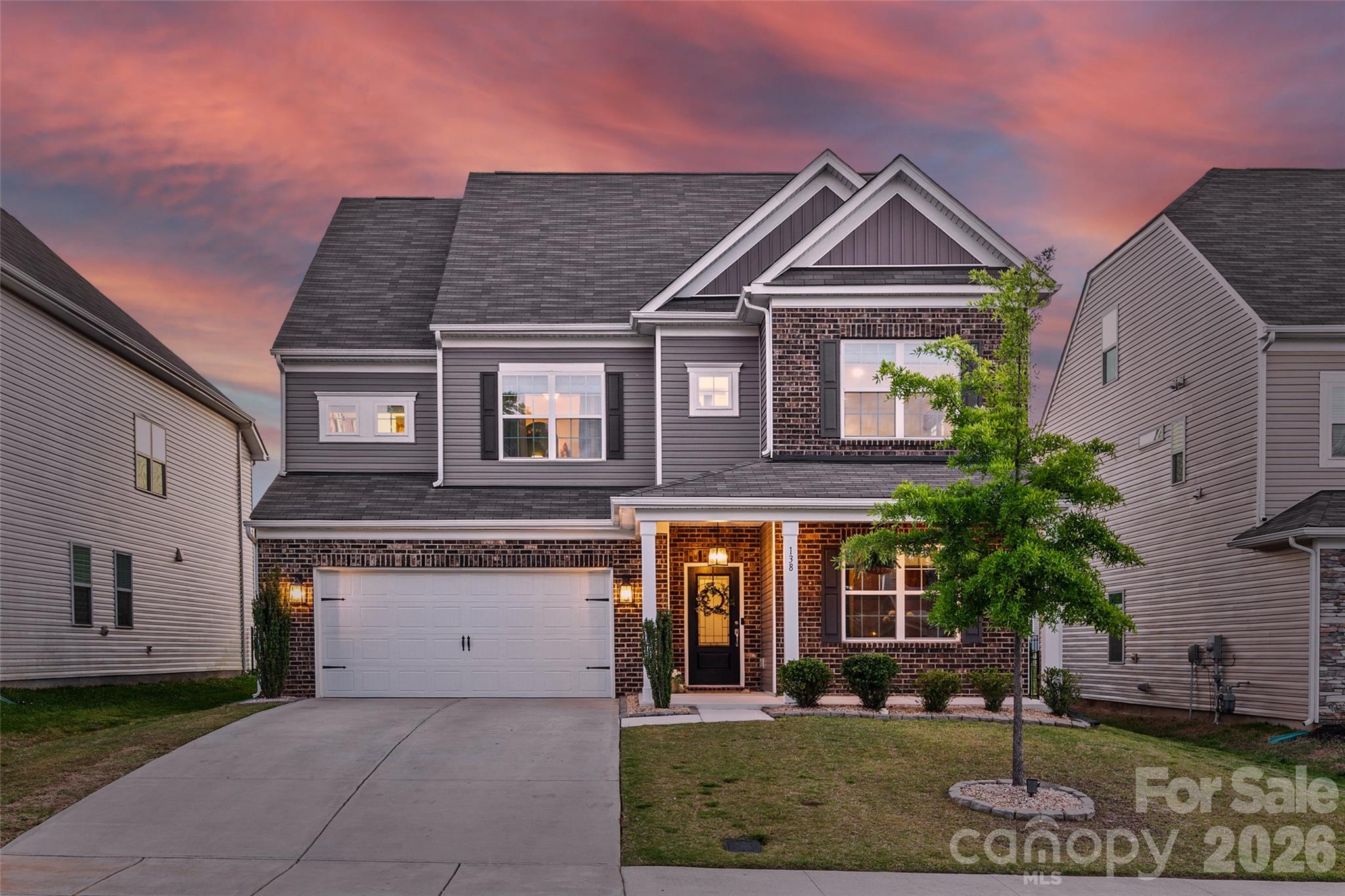 138 Lambeth Loop Mooresville, NC 28115 - Photo 2 of 48 front view of a house with a yard