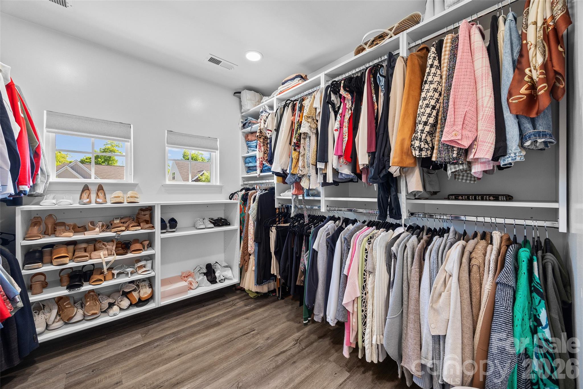 138 Lambeth Loop Mooresville, NC 28115 - Photo 23 of 48 a view of walk in closet with clothes and shoes