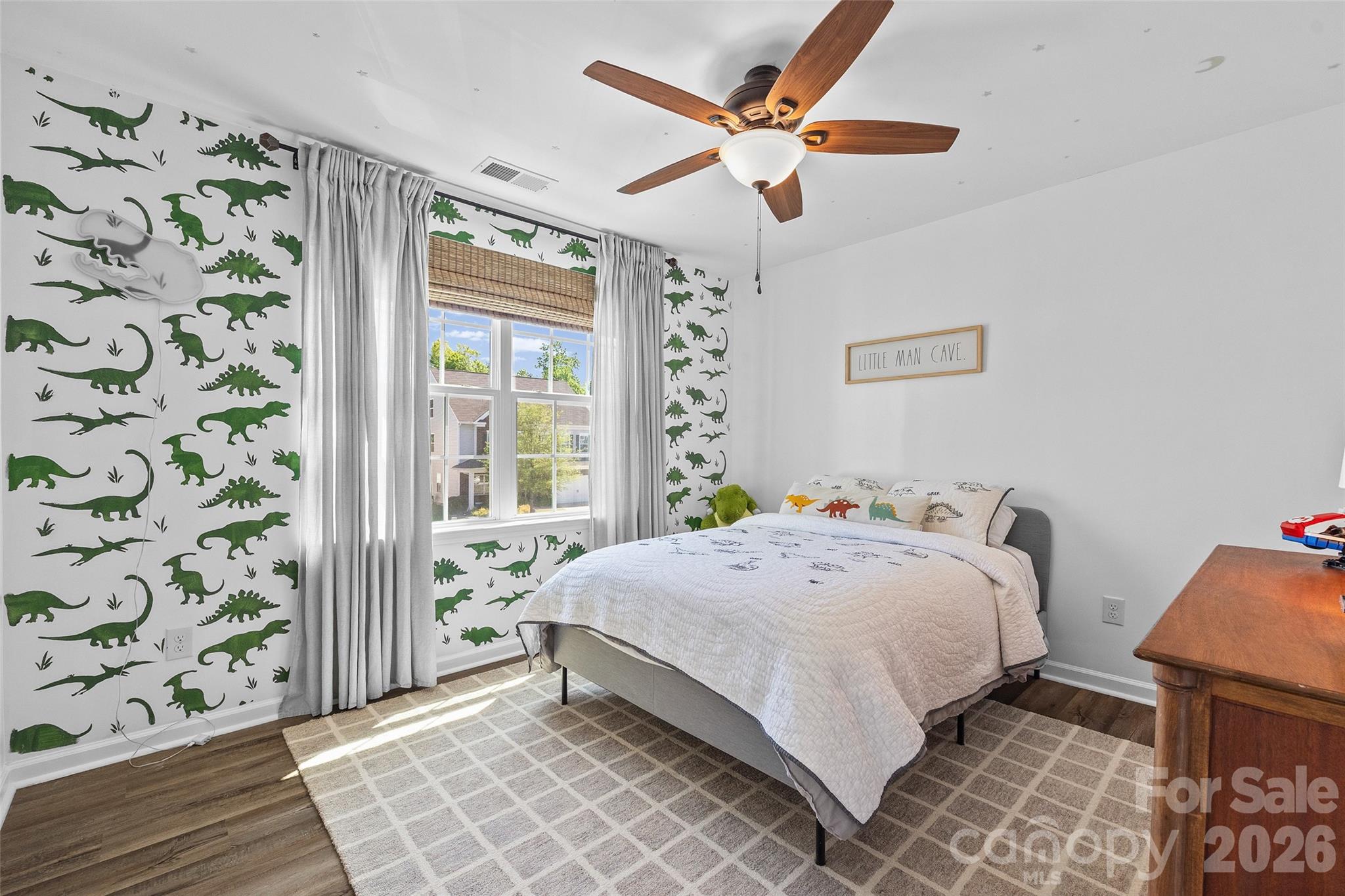 138 Lambeth Loop Mooresville, NC 28115 - Photo 27 of 48 a bedroom with a bed and a window