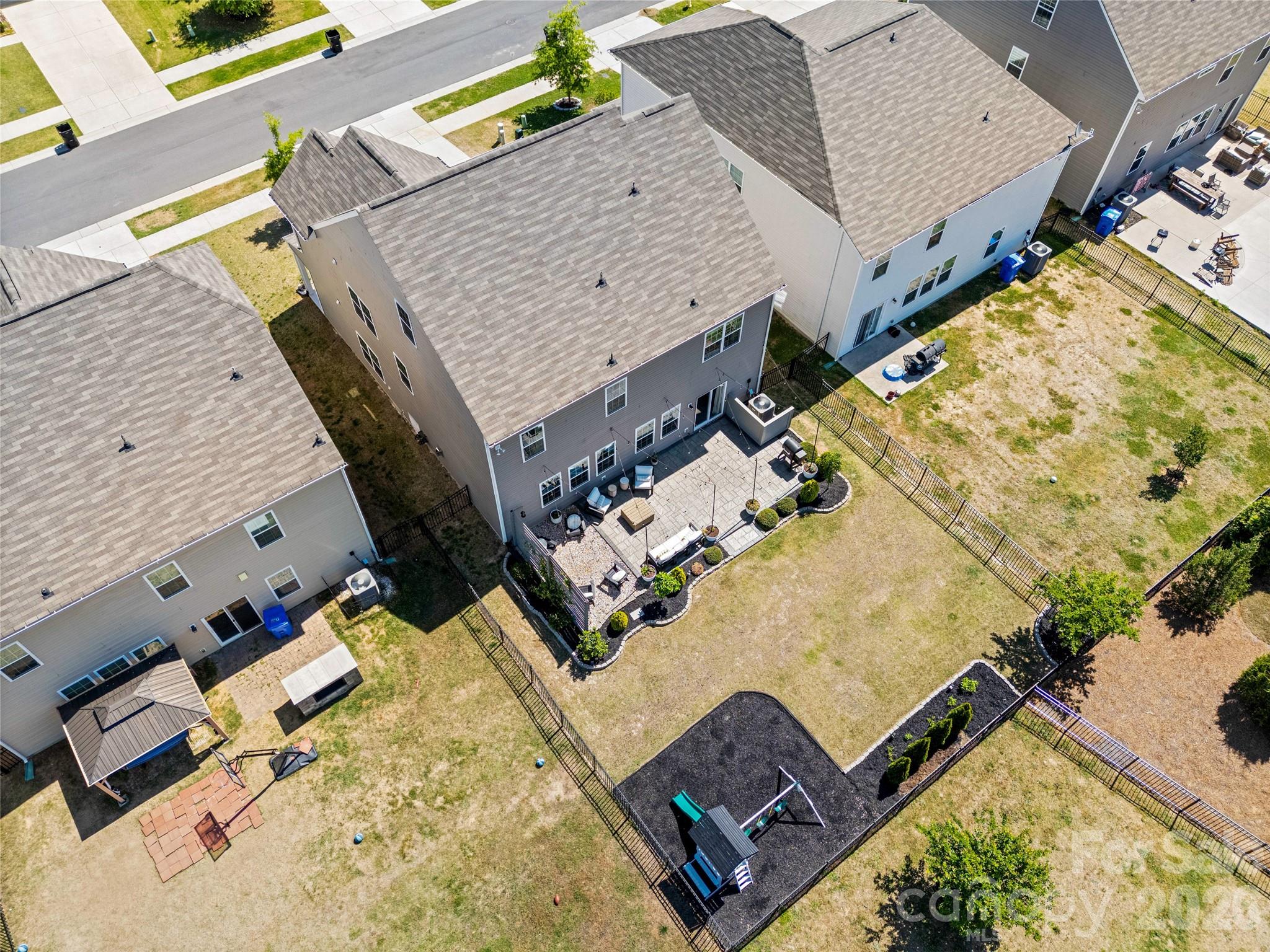 138 Lambeth Loop Mooresville, NC 28115 - Photo 39 of 48 an aerial view of a house with a yard