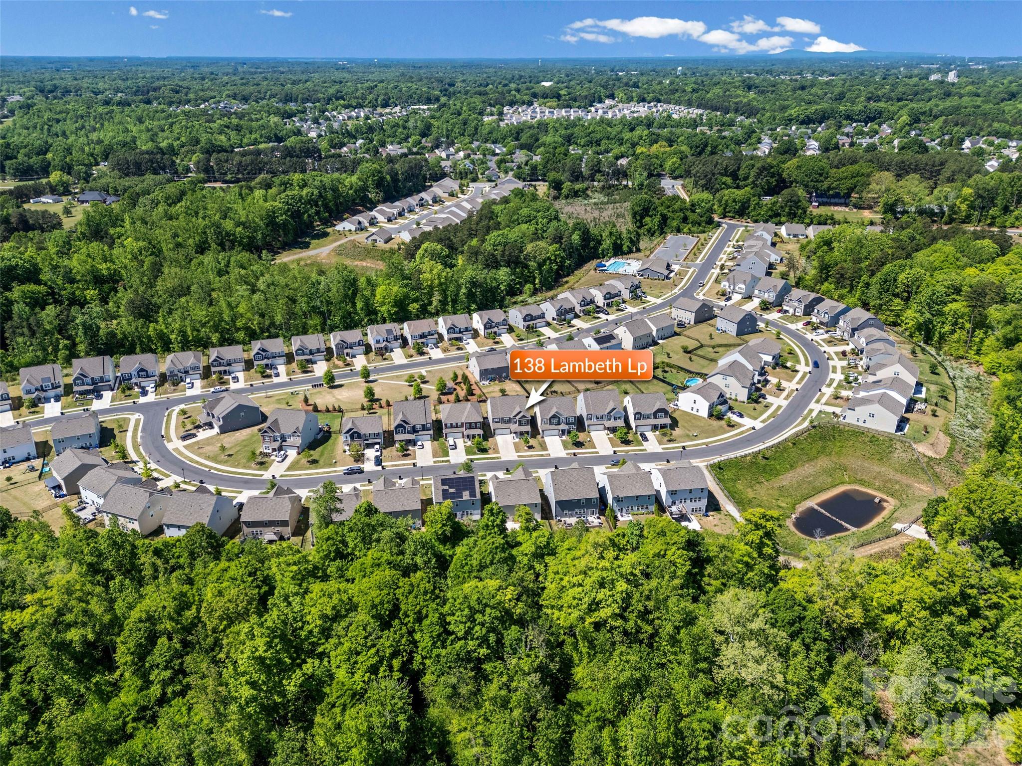 138 Lambeth Loop Mooresville, NC 28115 - Photo 44 of 48 a aerial view of a house with a garden