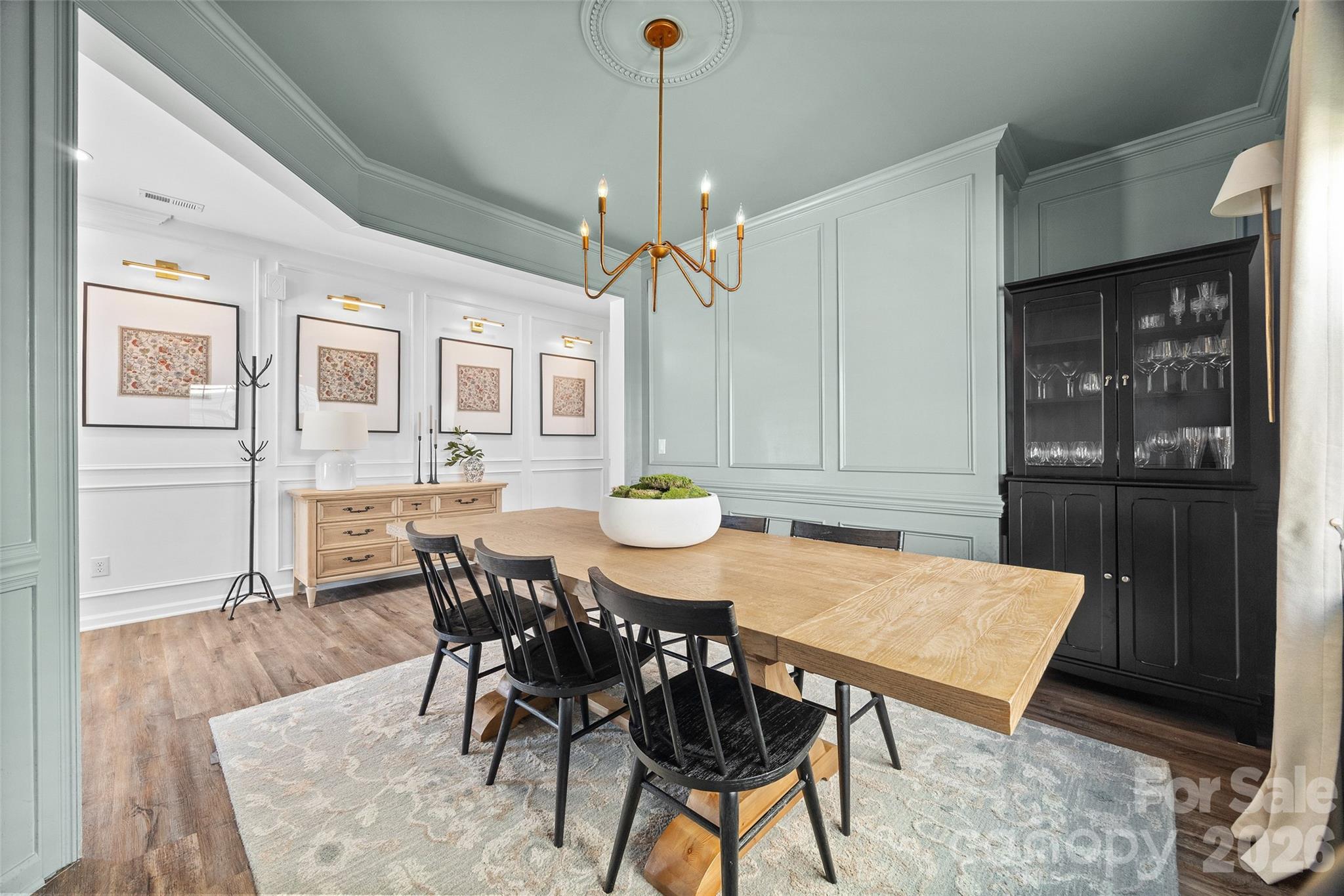 138 Lambeth Loop Mooresville, NC 28115 - Photo 7 of 48 a view of a dining room with furniture and wooden floor