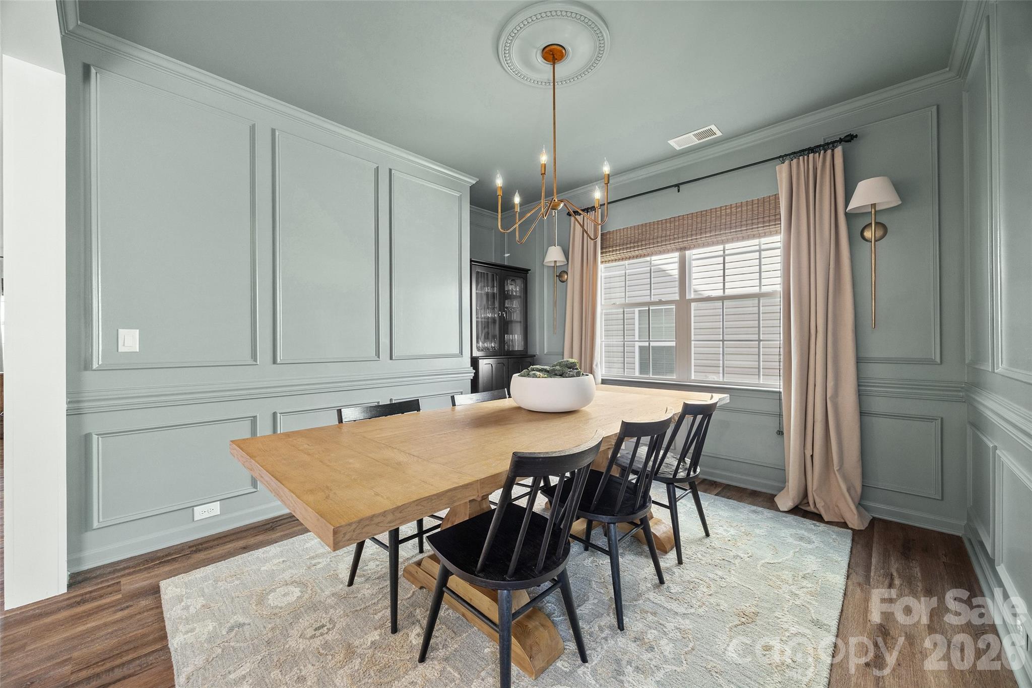138 Lambeth Loop Mooresville, NC 28115 - Photo 8 of 48 a view of a dining room with furniture window and wooden floor