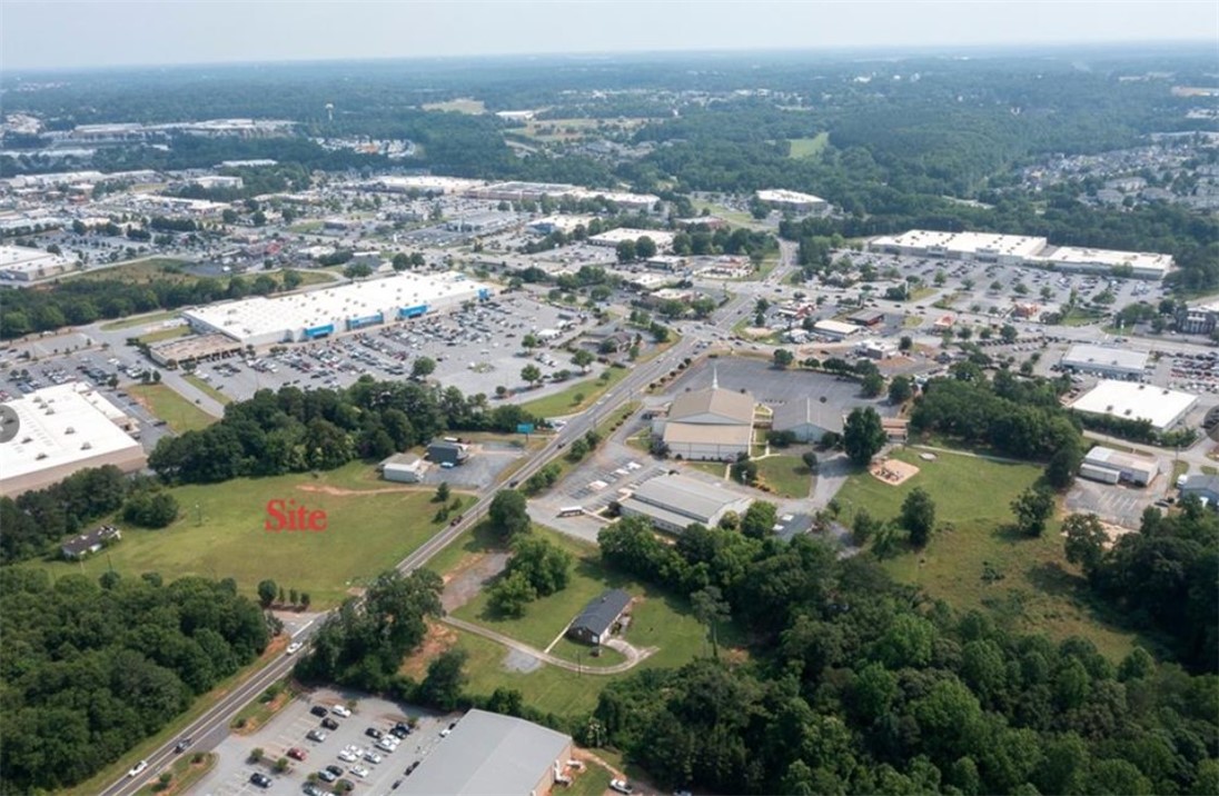 222 Brown Road Anderson, SC 29621 - Photo 10 of 12 An aerial perspective reveals a prime development site amidst commercial and residential areas.