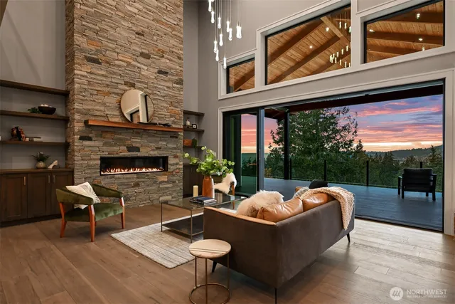 a outdoor living space with furniture and a fireplace