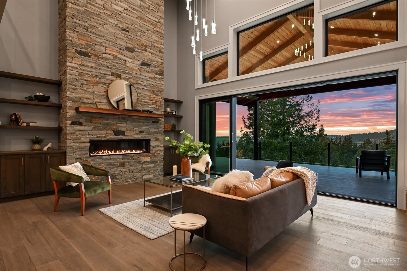 555 Whitecap Road Bellingham, WA 98229 - Photo 7 of 40 a outdoor living space with furniture and a fireplace