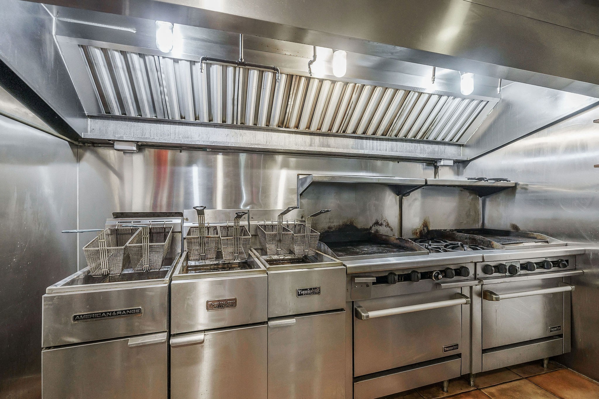 1967 Rock Island Road Rock Island, TN 38581 - Photo 24 of 39 a kitchen with a stove a sink and a refrigerator