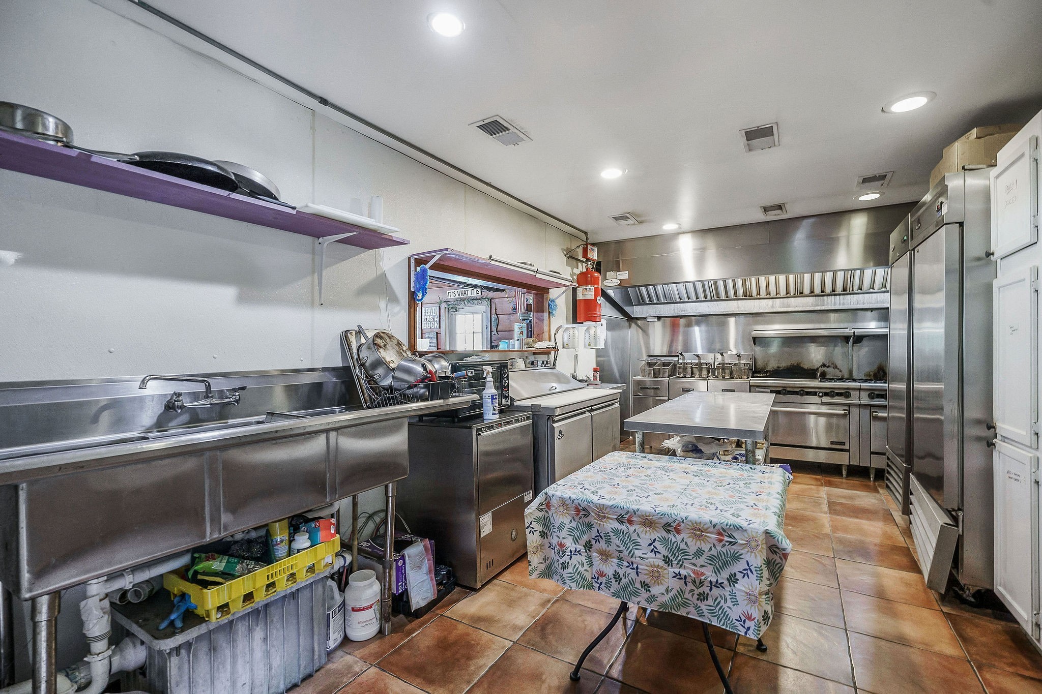 1967 Rock Island Road Rock Island, TN 38581 - Photo 26 of 39 a kitchen with stainless steel appliances granite countertop a sink a stove and a refrigerator