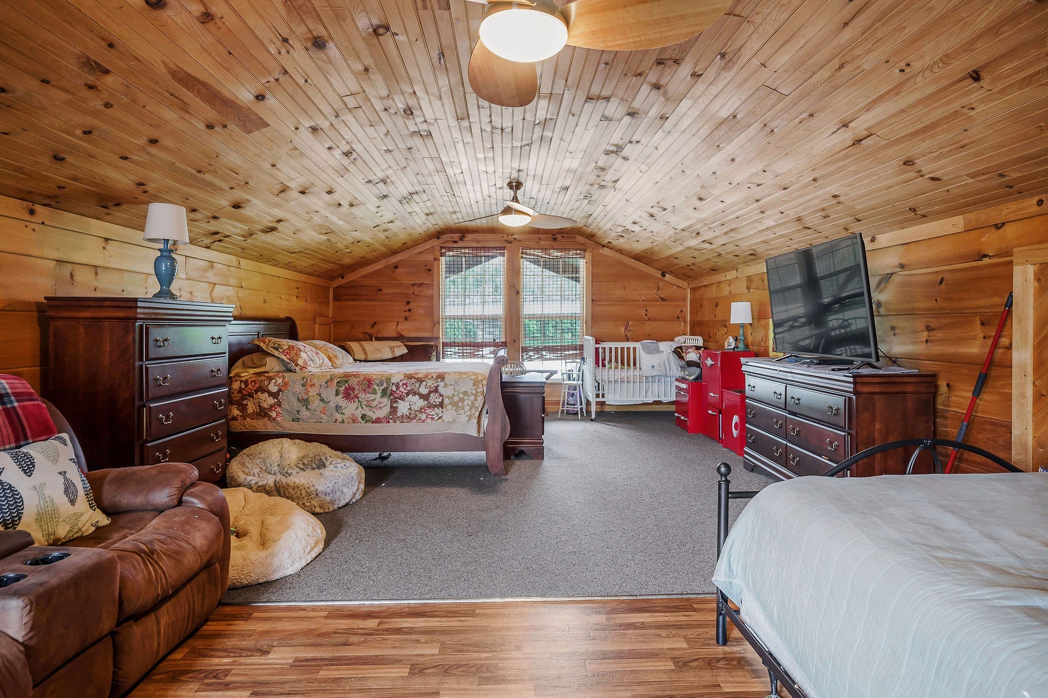 1967 Rock Island Road Rock Island, TN 38581 - Photo 29 of 39 a bedroom with furniture and a chandelier