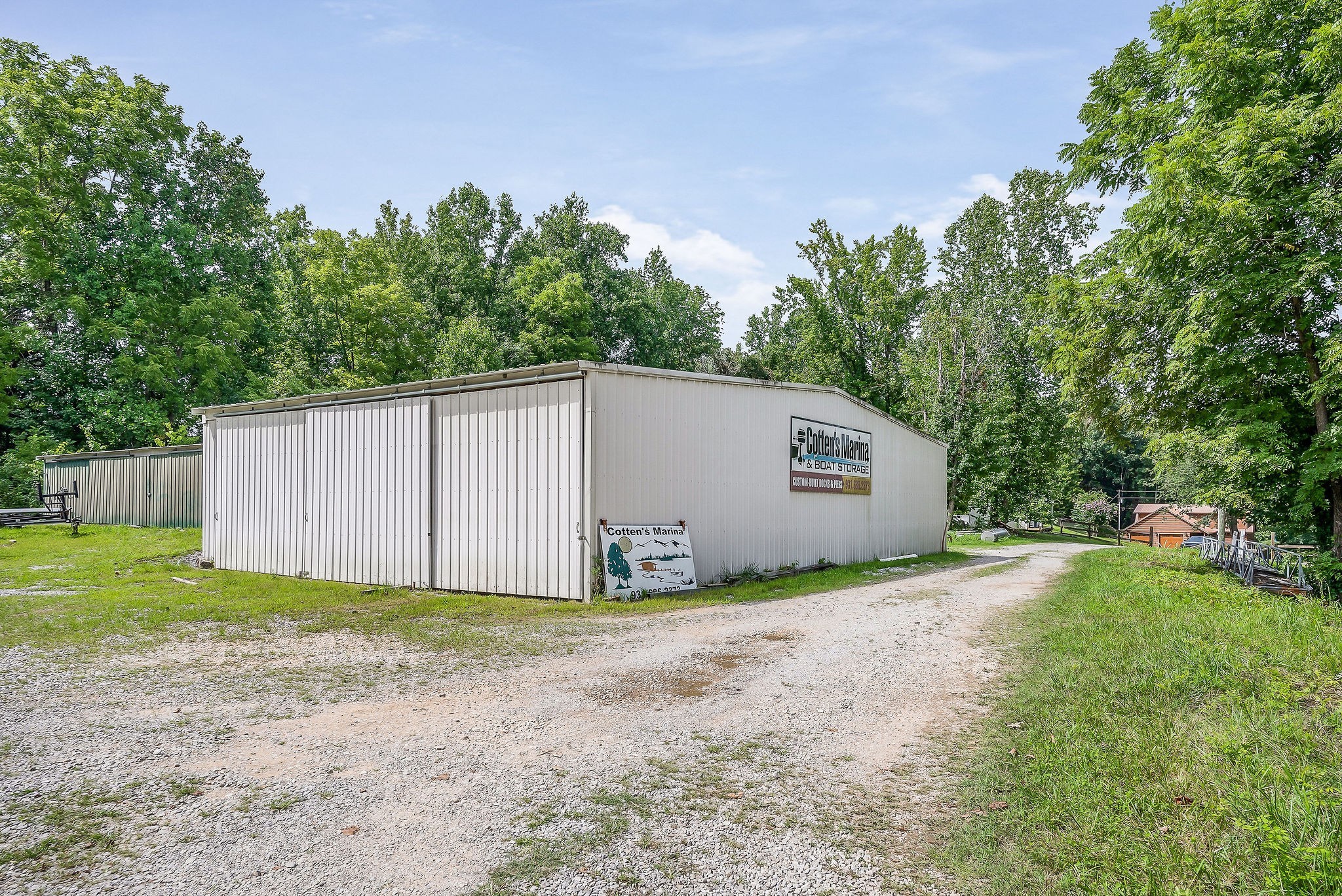 1967 Rock Island Road Rock Island, TN 38581 - Photo 34 of 39 a view of a house with backyard and trees in the background