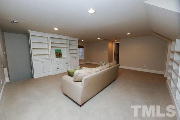 2425 Coley Forest Place Raleigh, NC 27612 - Photo 20 of 24 a living room with furniture