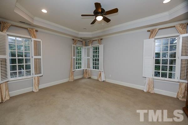 2425 Coley Forest Place Raleigh, NC 27612 - Photo 10 of 24 a view of an empty room with a window