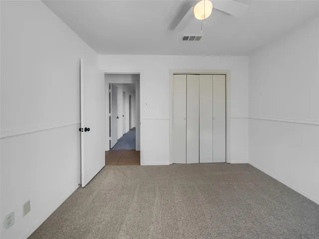 a view of a room with an empty space