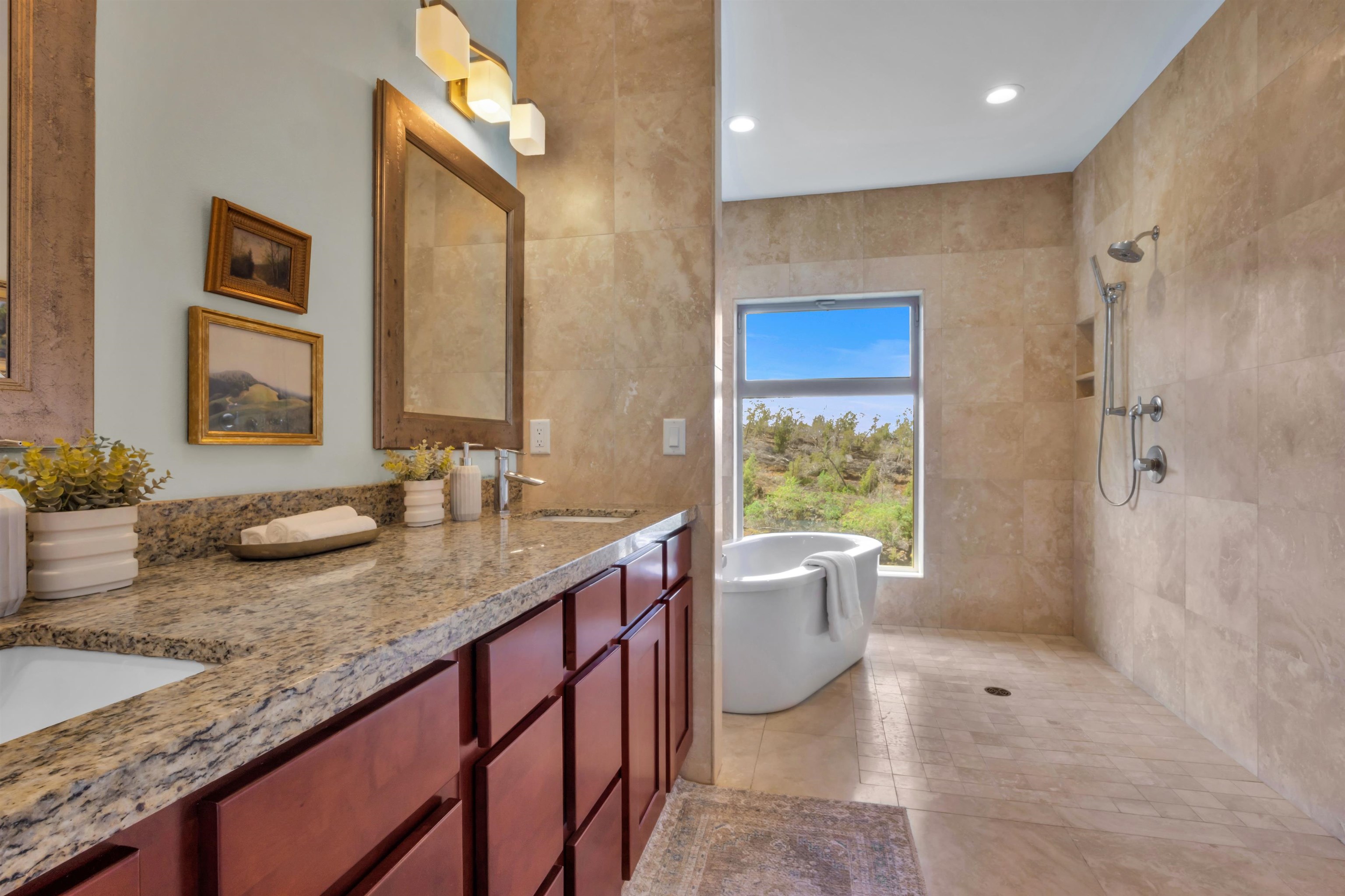 183 Kulamanu Circle Kula, HI 96790 - Photo 23 of 42 a bathroom with a granite countertop sink a mirror and a bathtub