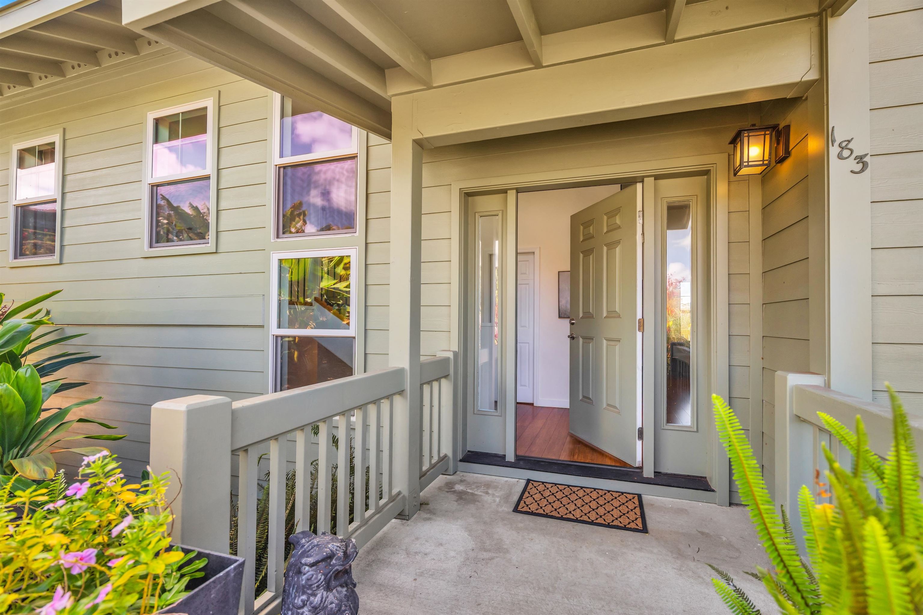 183 Kulamanu Circle Kula, HI 96790 - Photo 3 of 42 a front view of a house with a garden