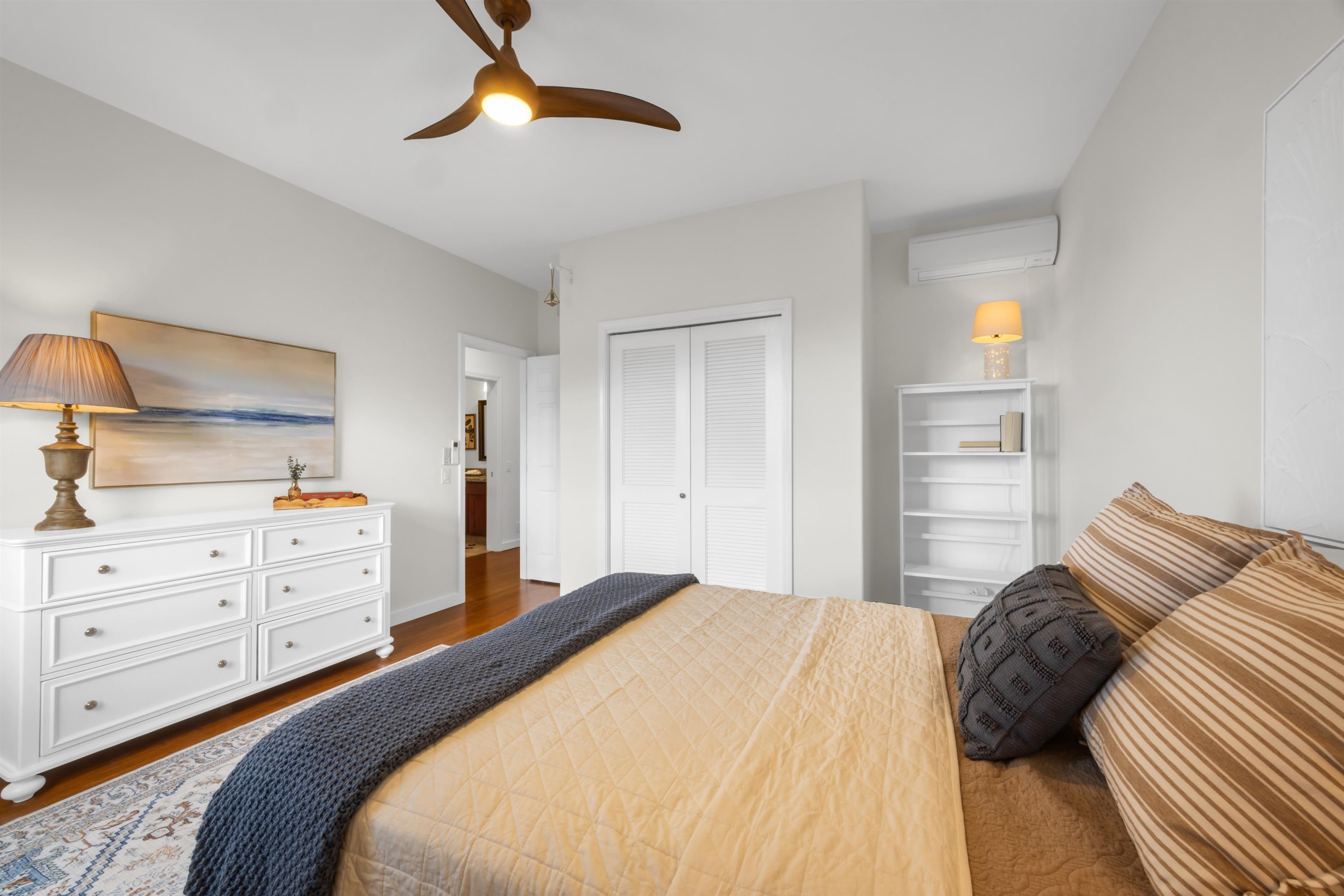 183 Kulamanu Circle Kula, HI 96790 - Photo 31 of 42 a bedroom with a bed and a chandelier