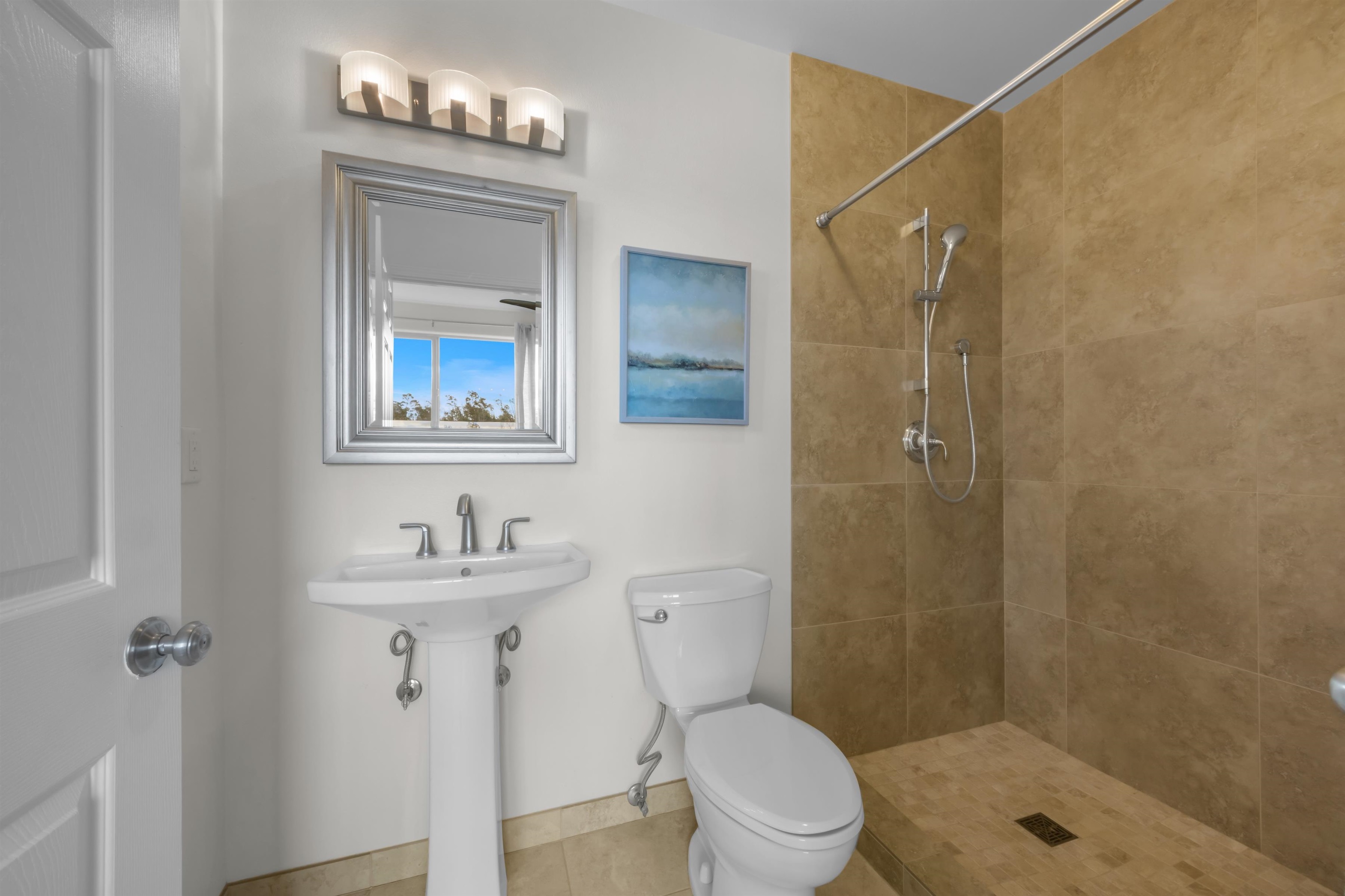 183 Kulamanu Circle Kula, HI 96790 - Photo 36 of 42 a bathroom with a sink a toilet a mirror and shower