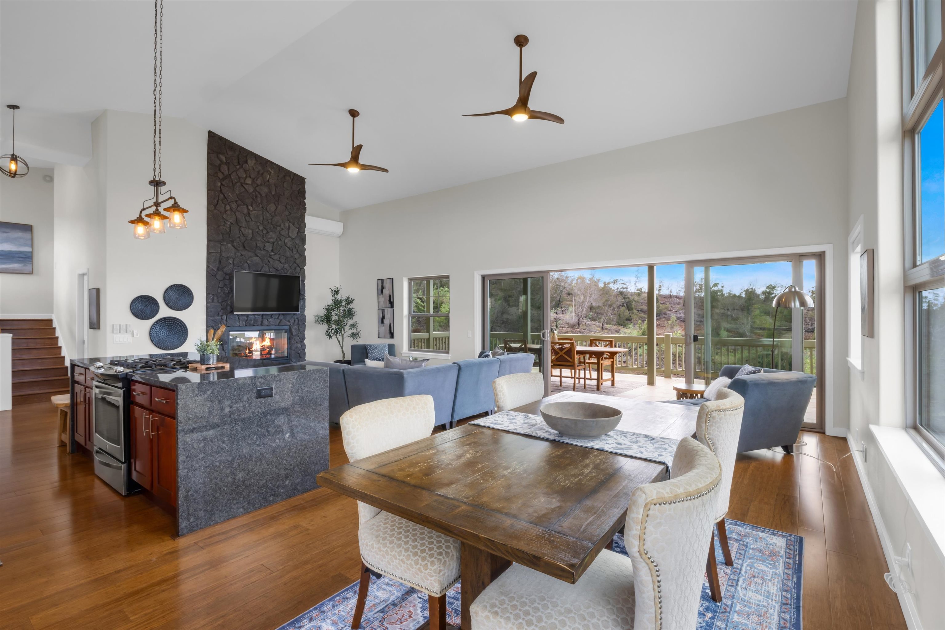 183 Kulamanu Circle Kula, HI 96790 - Photo 7 of 42 a living room with fireplace furniture and a large window
