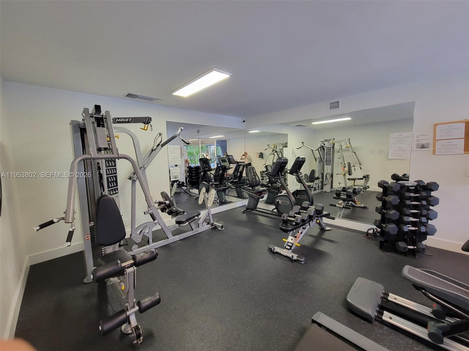 4550 Northwest 9th Street, Unit 315E Miami, FL 33126 - Photo 15 of 15 a view of a room with gym equipment
