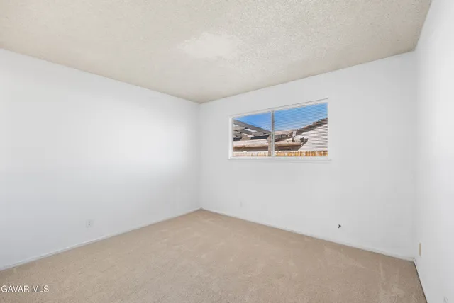 an empty room with closet