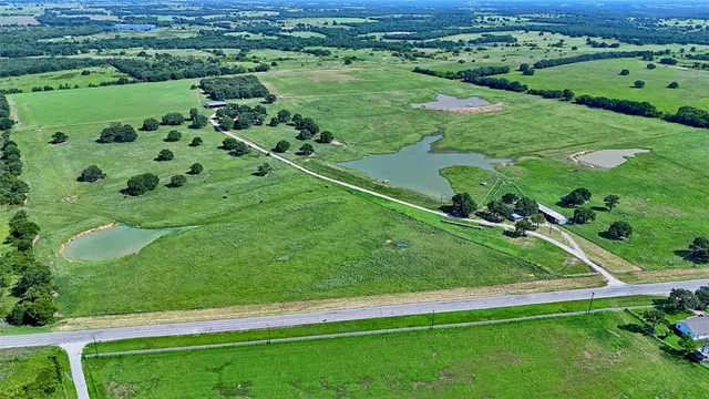 a view of a green field with lots of green space