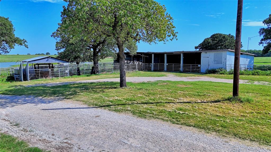 8752 Fm 1749 Sunset, TX 76270 - Photo 16 of 40 a view of a house with a backyard