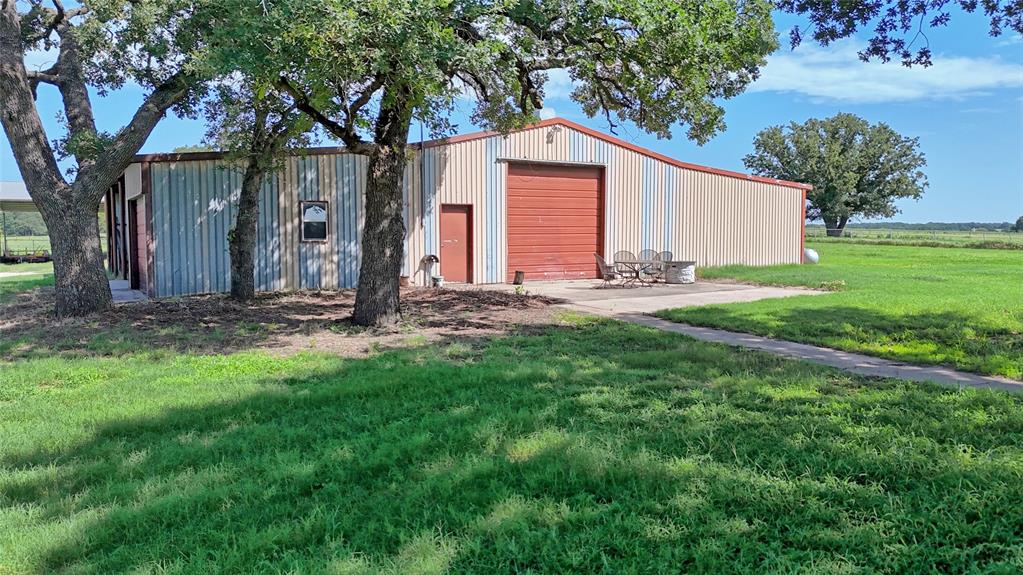 8752 Fm 1749 Sunset, TX 76270 - Photo 17 of 40 a view of a house with yard and tree s