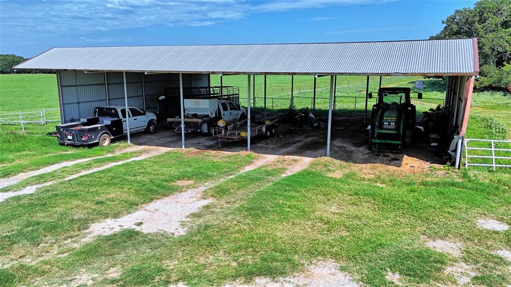 8752 Fm 1749 Sunset, TX 76270 - Photo 21 of 40 a view of a house with backyard porch and sitting area