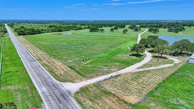 a view of a yard with a garden