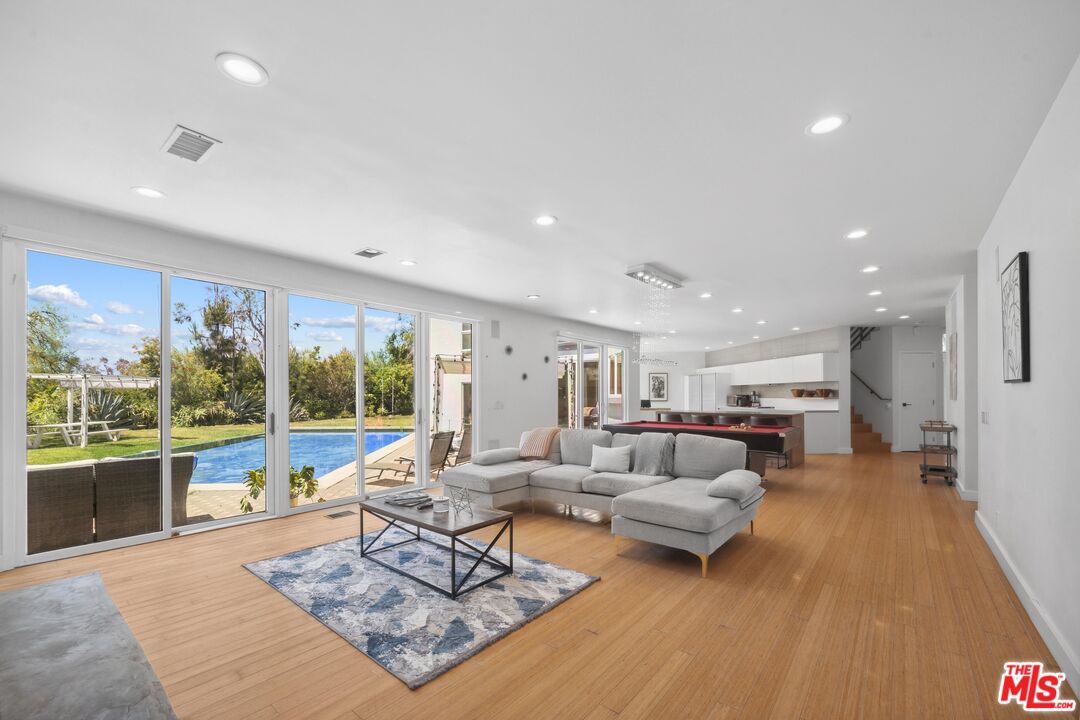 23400 West Moon Shadows Drive Malibu, CA 90265 - Photo 12 of 31 a living room with furniture and a large window