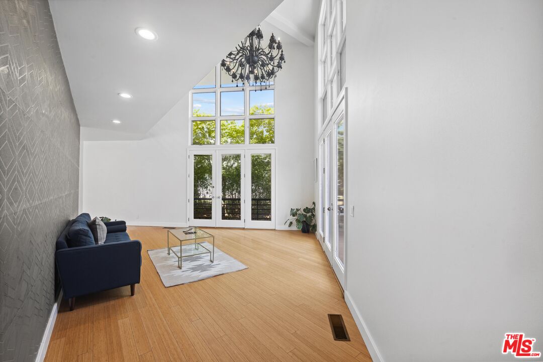 23400 West Moon Shadows Drive Malibu, CA 90265 - Photo 10 of 31 a bedroom with a bed and a large window