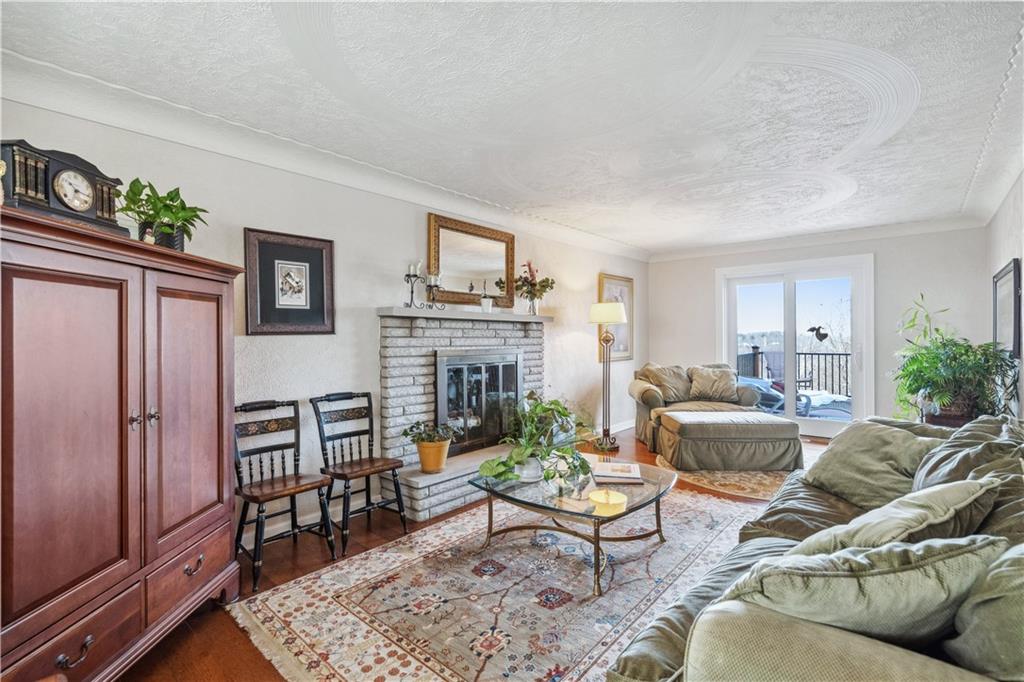 220 County Line Road Bridgeville, PA 15017 - Photo 22 of 50 Living Room That Leads To The Large Back Deck