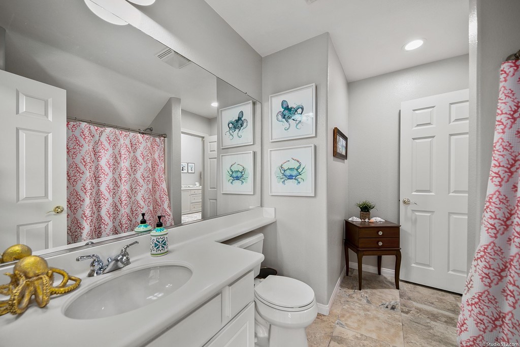 811 Inverlochy Drive Fallbrook, CA 92028 - Photo 11 of 27 a bathroom with a sink toilet and shower