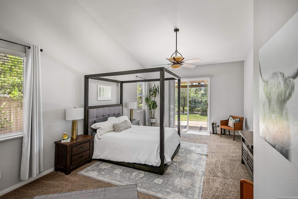 811 Inverlochy Drive Fallbrook, CA 92028 - Photo 14 of 27 a bed room with a bed and a chandelier