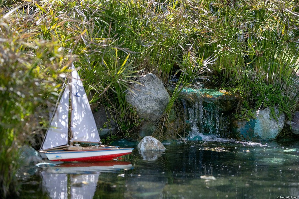 811 Inverlochy Drive Fallbrook, CA 92028 - Photo 22 of 27 a utility room with lots of trees