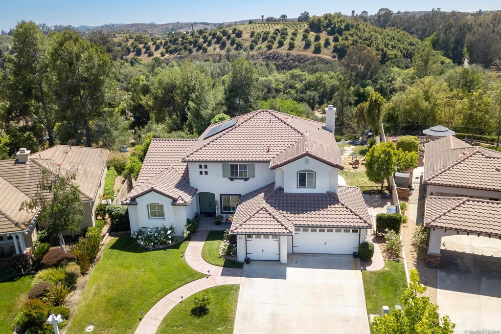 811 Inverlochy Drive Fallbrook, CA 92028 - Photo 26 of 27 a front view of a house with a yard