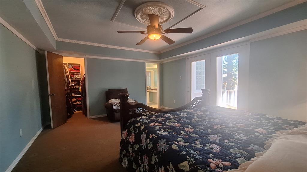 613 Colts Neck Court Colleyville, TX 76034 - Photo 12 of 38 another view of master suite with french door to back patio, 2 WI closets, apacious ensuite bath