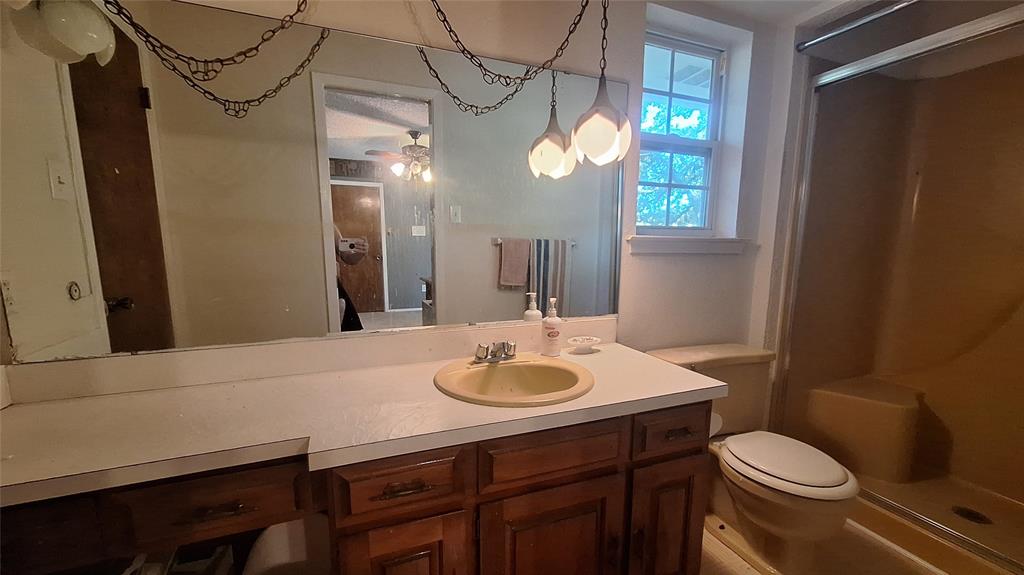 613 Colts Neck Court Colleyville, TX 76034 - Photo 33 of 38 upstairs ensuite bath between upstairs BR 4&5, makeup vanity & shower